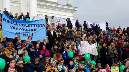 Protesters take part in a demonstration against racism and far right movements in downtown Helsinki, Finland, September 24, 2016. REUTERS/Attila Cser