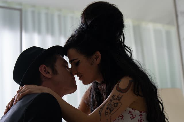 <p>Dean Rogers/Focus Features</p> Jack O'Connell as Blake Fielder-Civil and Marisa Abela as Amy Winehouse in 'Back to Black'