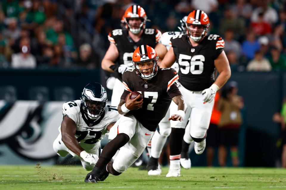 Cleveland Browns quarterback Dorian Thompson-Robinson (17) is tackles by Philadelphia Eagles defensive tackle Moro Ojomo (72) during the second quarter of a preseason game, Thursday, Aug. 17, 2023, in Philadelphia.