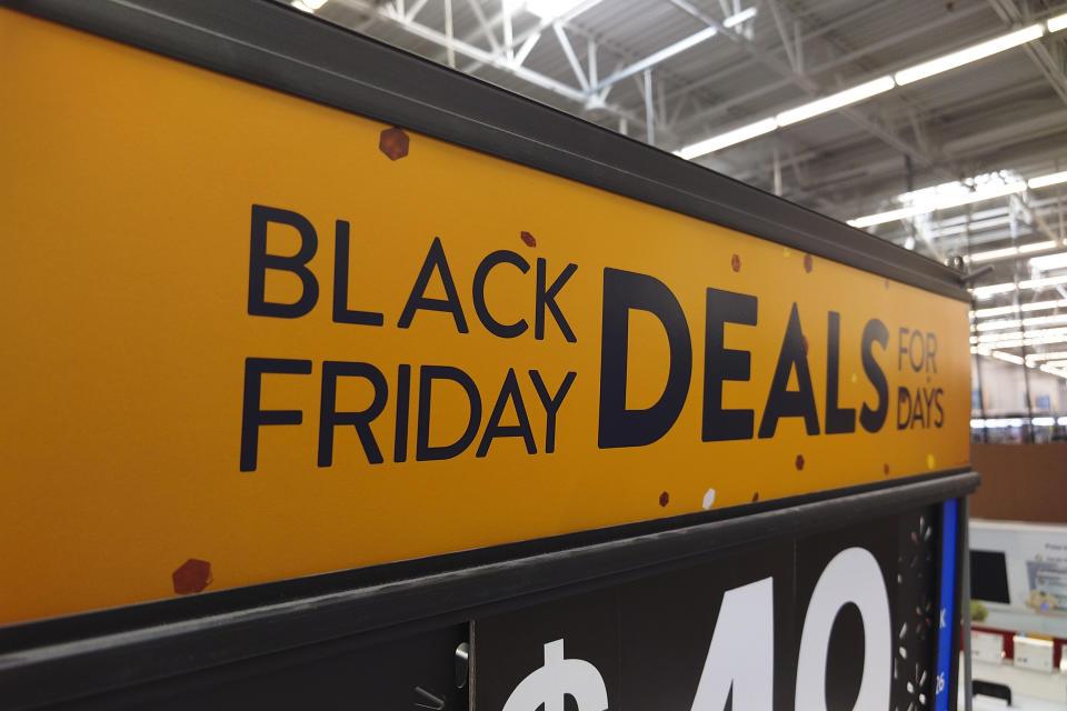 A "Black Friday" sign is posted at a retail location in Philadelphia, Monday, Nov. 21, 2022. Bargain hunting is back with full force heading into the holidays. But inflation is limiting how much of a deal consumers will be getting. (AP Photo/Matt Rourke)