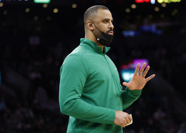 Boston Celtics head coach Ime Udoka gestures to his team during the first half of an NBA basketball game against the New Orleans Pelicans, Monday, Jan. 17, 2022, in Boston. (AP Photo/Mary Schwalm)