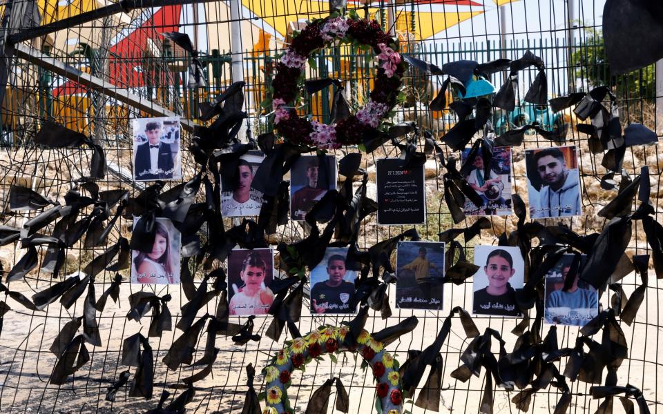 Portraits of the children and youngsters who were killed on Saturday in a rocket strike in Golan Heights