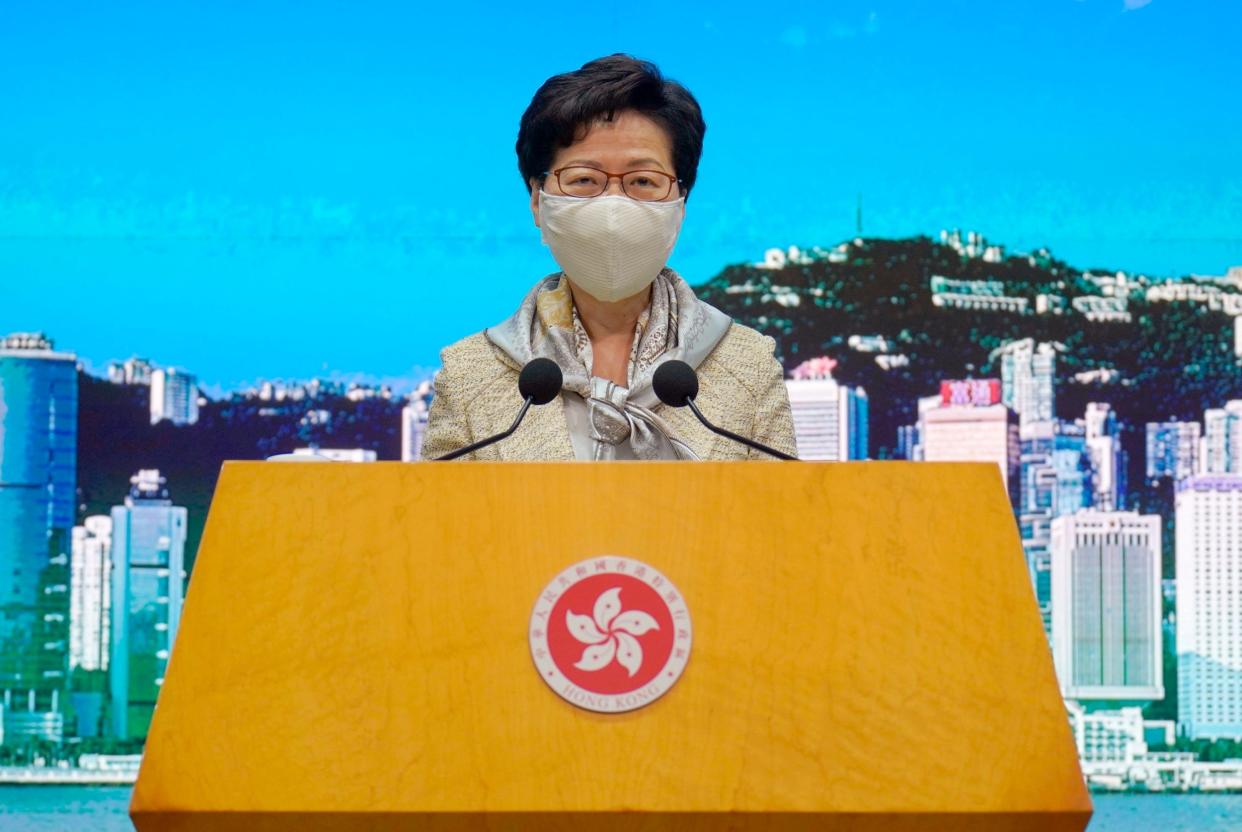 Hong Kong chief executive Carrie Lam speaks at a weekly press conference on Tuesday, 30 June, as Beijing passed a controversial new national security law: AP