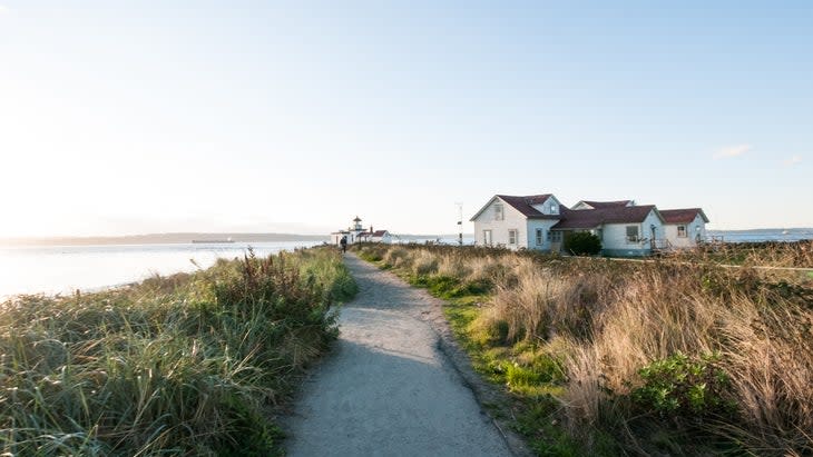 <span class="article__caption">Discovery Park runs along the shores of Puget Sound in Seattle</span> (Photo: Mondadori Portfolio / Getty)