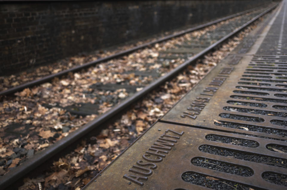 The name of the Nazi death camp Auschwitz photographed at 'Gleis 17', Track 17, the memorial site for the train transportation from Berlin to the camp, on International Holocaust Remembrance Day in Berlin, Germany, Saturday, Jan. 27, 2024. The International Holocaust Remembrance Day marks the anniversary of the liberation of the Nazi death camp Auschwitz - Birkenau on Jan. 27, 1945. (AP Photo/Markus Schreiber)