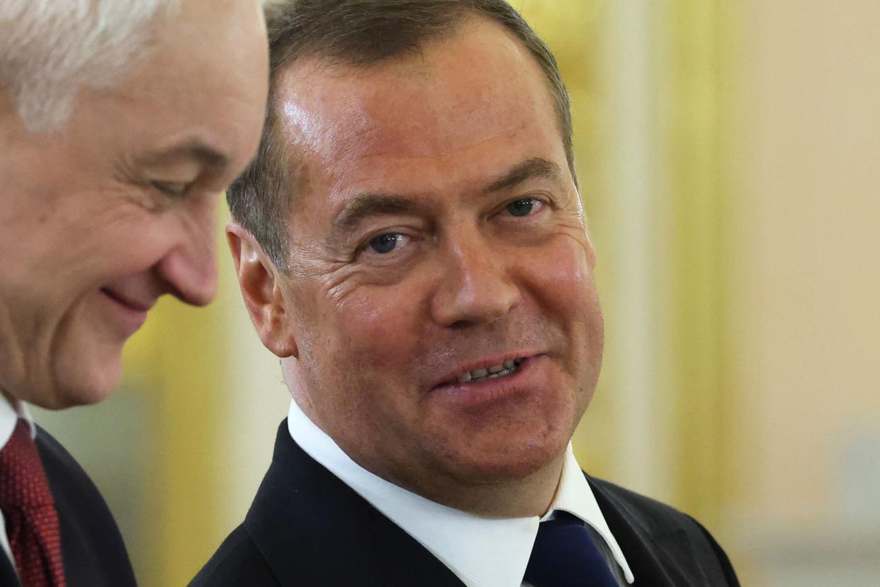 Russia’s former leader Dmitry Medvedev, a President Putin ally who is now deputy chairman of the country’s security council, is seen before a meeting on 21 March 2023 (SPUTNIK/AFP via Getty Images)