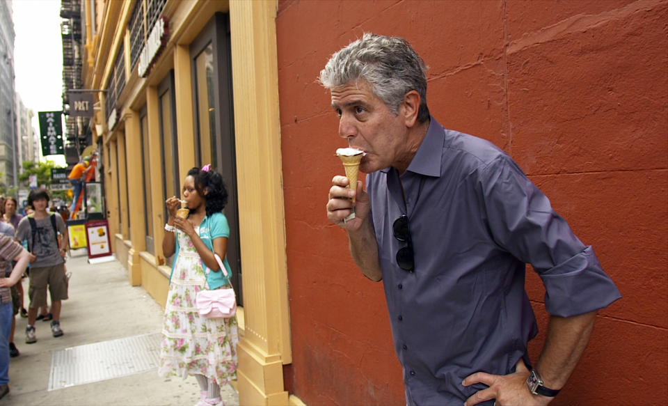 This image released by Focus Features shows Anthony Bourdain in Morgan Neville's documentary "Roadrunner." The film will have its world premiere at the Tribeca Film Festival on Friday, June 11, 2021. (Focus Features via AP)