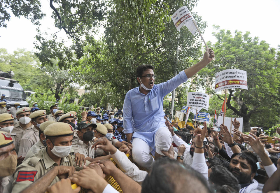 Congress party workers shout slogans during a protest accusing Prime Minister Narendra Modi’s government of using military-grade spyware to monitor political opponents, journalists and activists in New Delhi, India, Tuesday, July 20, 2021. The protests came after an investigation by a global media consortium was published on Sunday. Based on leaked targeting data, the findings provided evidence that the spyware from Israel-based NSO Group, the world’s most infamous hacker-for-hire company, was used to allegedly infiltrate devices belonging to a range of targets, including journalists, activists and political opponents in 50 countries. (AP Photo/Manish Swarup)