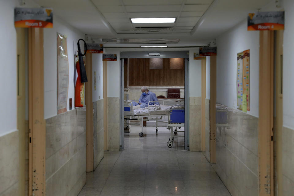 A COVID-19 patient is treated at the Shohadaye Tajrish Hospital in Tehran, Iran, Sunday, April 18, 2021. After facing criticism for downplaying the virus last year, authorities have put partial lockdowns and other measures in place to try and slow the coronavirus’ spread, as Iran faces what looks like its worst wave of the coronavirus pandemic yet. (AP Photo/Ebrahim Noroozi)