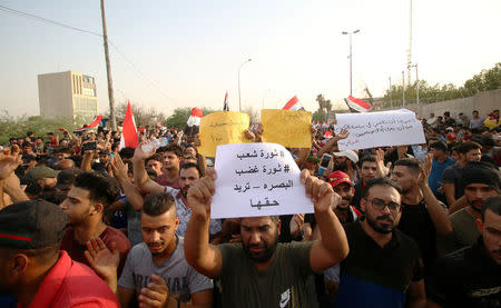 Protesters gather near the main provincial government building in Basra, Iraq, July 20, 2018. REUTERS/Essam al-Sudani