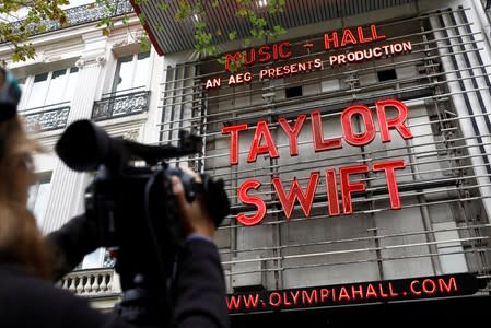 The Olympia Theatre lights up with the name of Taylor Swift prior to her concert performance in Paris