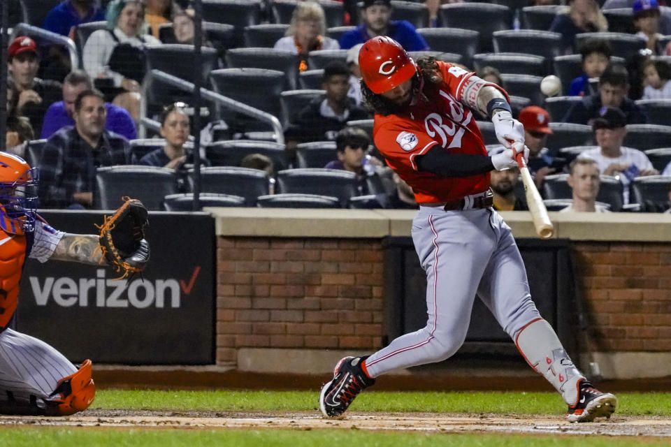 Cincinnati Reds' Jonathan India swings at a pitch during the first inning of a baseball game against the New York Mets, Saturday, Sept. 16, 2023, in New York. (AP Photo/Bebeto Matthews)