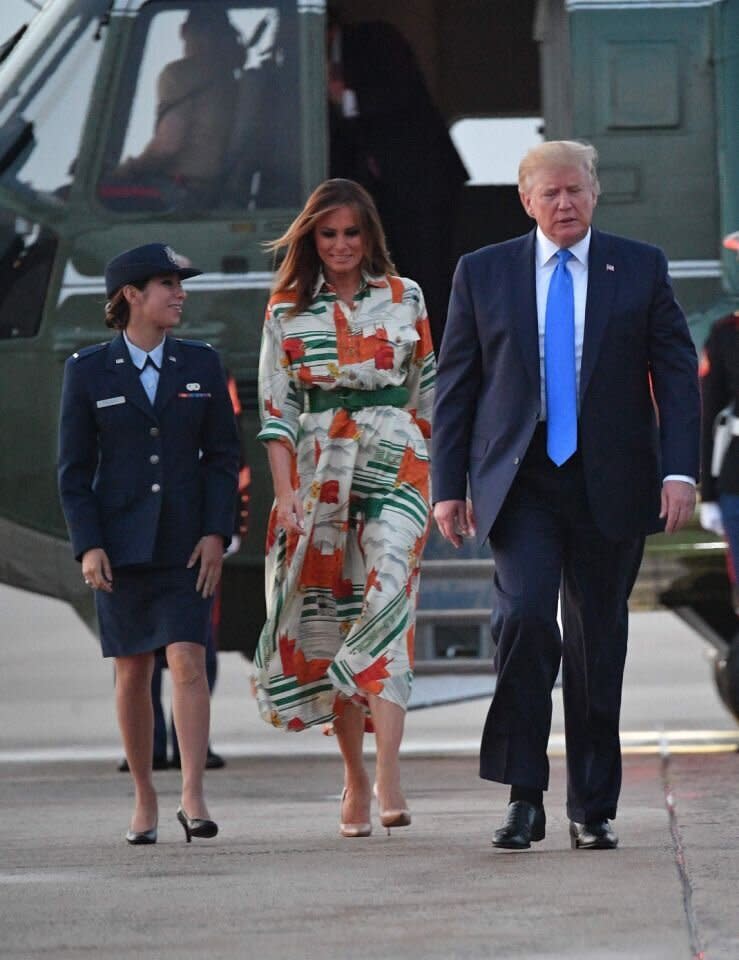 The First Lady's first dress of the trip was emblazoned with London landmarks. [Photo: Getty]