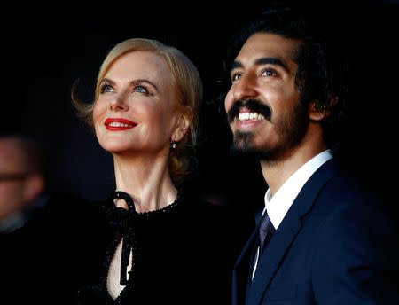 Nicole Kidman (L) poses alongside Dev Patel as they arrive for the gala screening of the film "Lion", during the 60th British Film Institute (BFI) London Film Festival at Leicester Square in London, Britain October 12, 2016. REUTERS/Peter Nicholls