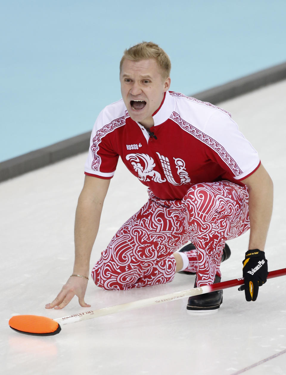 Russia’s skip Alexey Stukalskiy shouts instructions after delivering the rock against Great Britain in men's curling competition at the 2014 Winter Olympics, Monday, Feb. 10, 2014, in Sochi, Russia. (AP PhotoRobert F. Bukaty