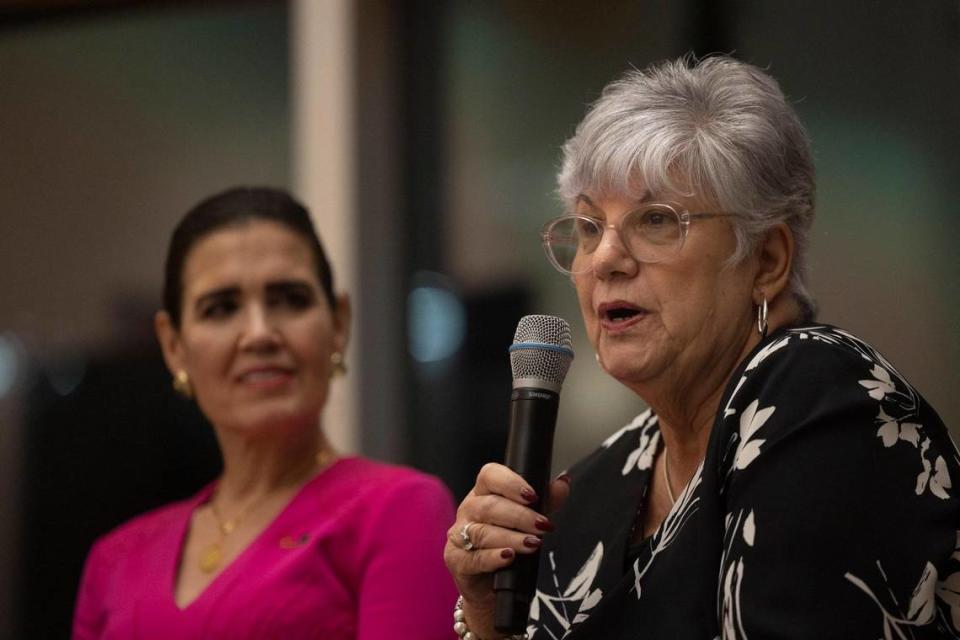 Uva de Aragón, author and literature professor, speaks while Ana VeigaMilton, president of the José Milton Foundation, listens during a panel discussion about the book “Cuban American Women: Making History” with women featured in the book on Thursday, Jan. 25, 2024, at Otto G. Richter Library at the University of Miami in Coral Gables.