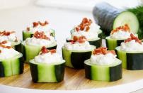 <p>This Cucumber Bites recipe is the ideal light summer appetizer or afternoon snack. Cucumbers are sliced and topped with cottage cheese, bacon and hot sauce. Pack it alongside more of our <a href="https://www.thedailymeal.com/entertain/perfect-foods-every-picnic-our-40-best-recipes-slideshow?referrer=yahoo&category=beauty_food&include_utm=1&utm_medium=referral&utm_source=yahoo&utm_campaign=feed" rel="nofollow noopener" target="_blank" data-ylk="slk:picnic recipes perfect for your blanket and basket;elm:context_link;itc:0;sec:content-canvas" class="link ">picnic recipes perfect for your blanket and basket</a>.</p> <p><a href="https://www.thedailymeal.com/best-recipes/cucumber-bites?referrer=yahoo&category=beauty_food&include_utm=1&utm_medium=referral&utm_source=yahoo&utm_campaign=feed" rel="nofollow noopener" target="_blank" data-ylk="slk:For the Cucumber Bites recipe, click here.;elm:context_link;itc:0;sec:content-canvas" class="link ">For the Cucumber Bites recipe, click here.</a></p>