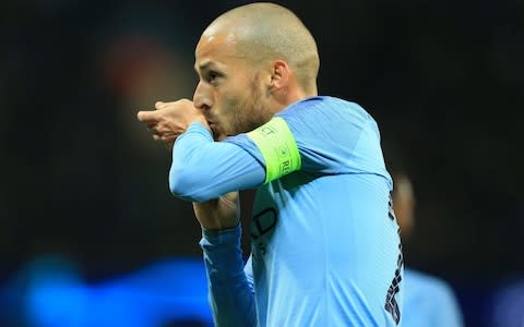 David Silva kisses his wrist after scoring a goal - Credit: GETTY IMAGES