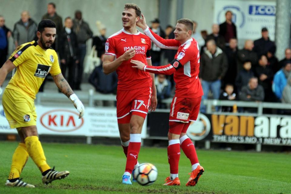 Paul Mullin congratulates Harry Smith on his goal against Dartford <i>(Image: Dave Evans)</i>