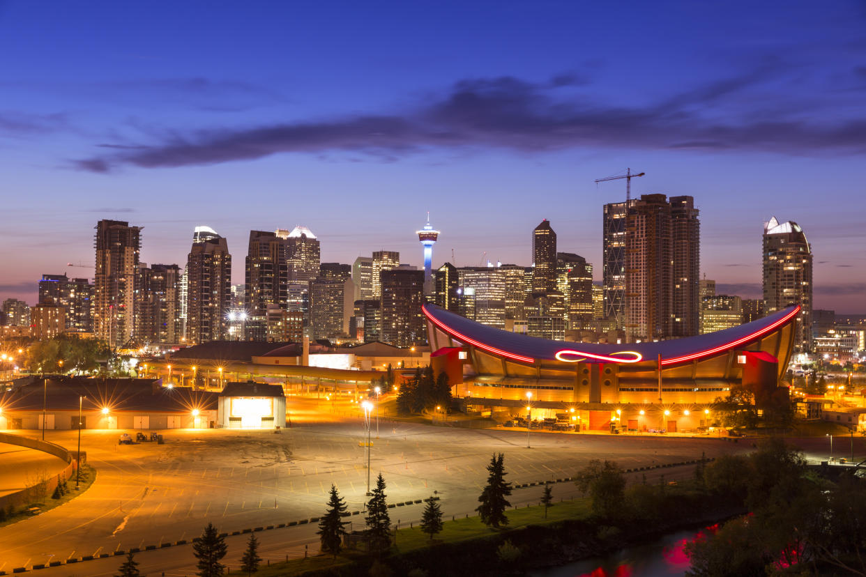 Calgary cityscape and Saddledome in Alberta Canada pinkcherry 