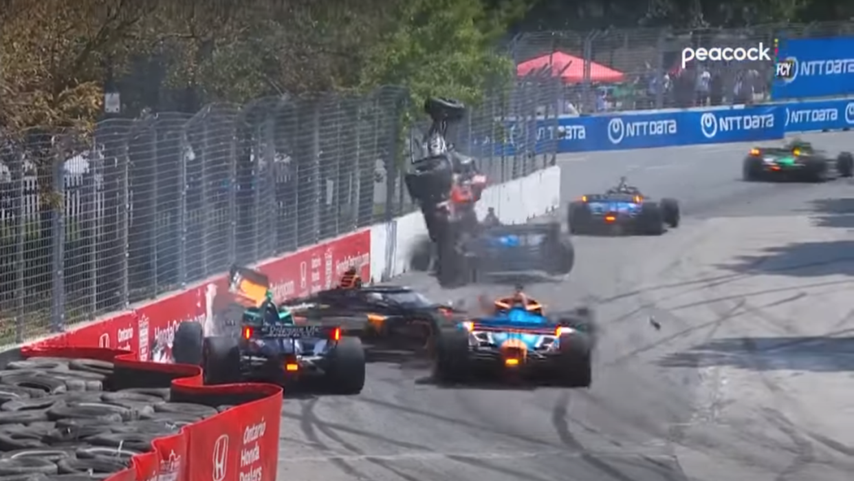 a group of race cars on a track