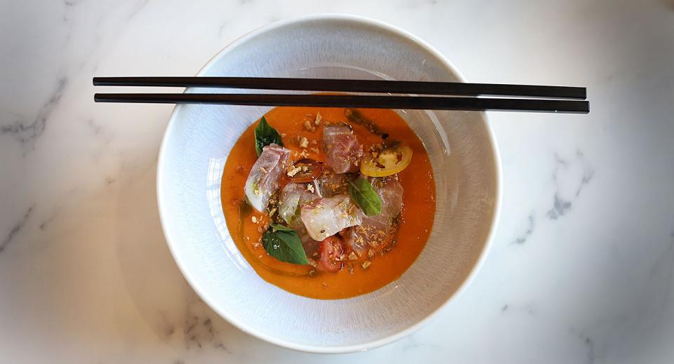 Crudo made with Pacific striped bass and a tomato compote with basil and yuzu. Let's Eat - Le Madeline on Hancock Street, North Quincy. Thursday March 21, 2024