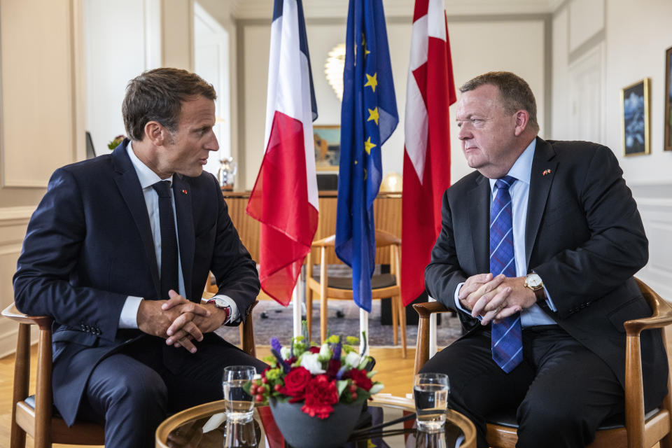 French President Emmanuel Macron, left, talks with Danish Prime Minister Lars Loekke Rasmussen during their meeting at Christiansborg Castle Castle in Copenhagen Denmark, Tuesday Aug. 28, 2018. Macron is on a two-day visit, hoping to build the relationships he needs to push France’s agenda of a more closely united European Union. (Olafur Steinar Gestsson/Ritzau Scanpix via AP)