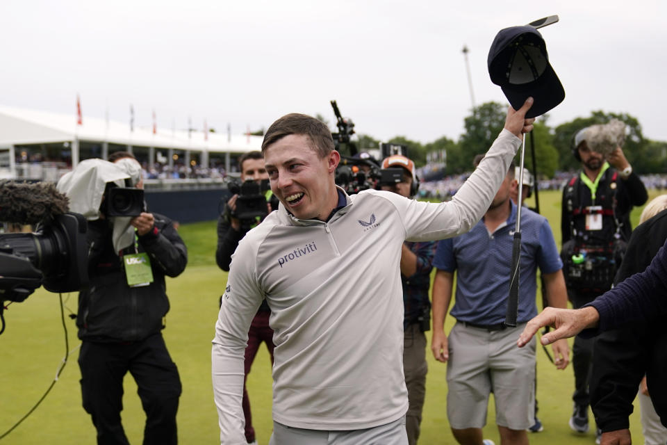 Matthew Fitzpatrick, of England, reacts after winning the U.S. Open golf tournament at The Country Club, Sunday, June 19, 2022, in Brookline, Mass. (AP Photo/Charles Krupa)