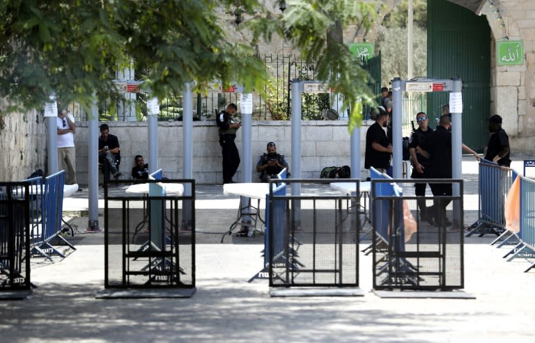 Israeli security forces are seen next to metal detectors, new security measures by Israeli authorities, outside the Lions Gate, a main entrance to Al-Aqsa mosque compound, in Jerusalem's Old City, on July 18, 2017