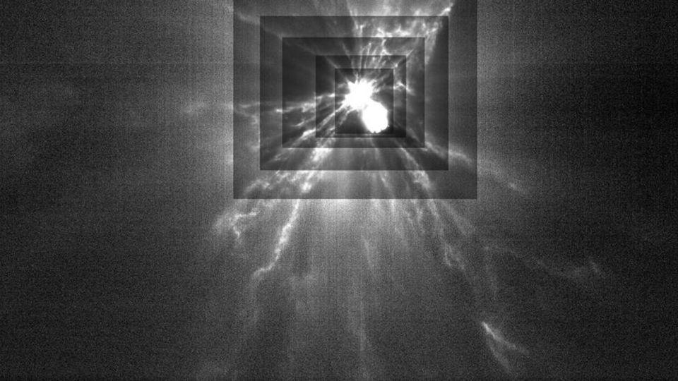 LICIACube shows debris plumes streaming from asteroid Dimorphos after NASA's Double Asteroid Reorientation Test impacted it on September 26, 2022. - ASI/NASA/APL