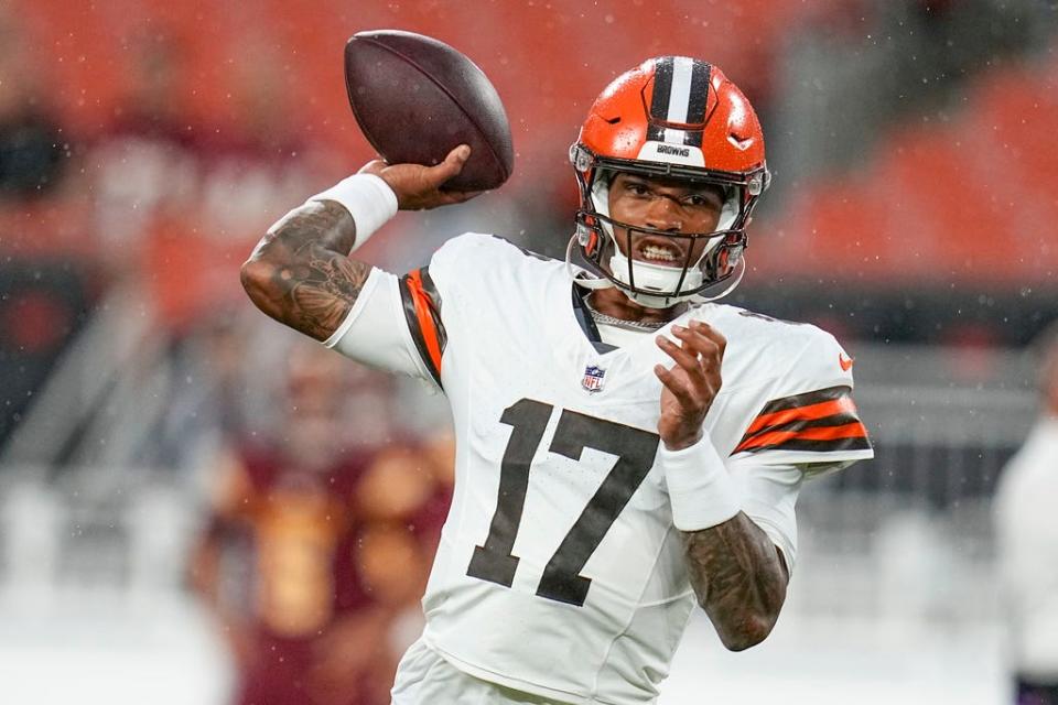 Cleveland Browns quarterback Dorian Thompson-Robinson warms up before a preseason NFL football game against the Washington Commanders on Friday, Aug. 11, 2023, in Cleveland. (AP Photo/Sue Ogrocki)