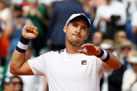 Tennis - ATP 1000 - Monte Carlo Masters - Monte-Carlo Country Club, Roquebrune-Cap-Martin, France - April 20, 2019 Serbia's Dusan Lajovic celebrates victory after his match against Russia's Daniil Medvedev REUTERS/Eric Gaillard