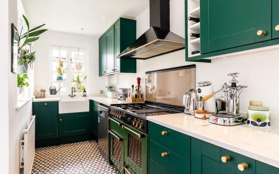 A two-bedroom, red brick terraced house in a private estate with communal gardens in East Sheen — £800,000 with Knight Frank