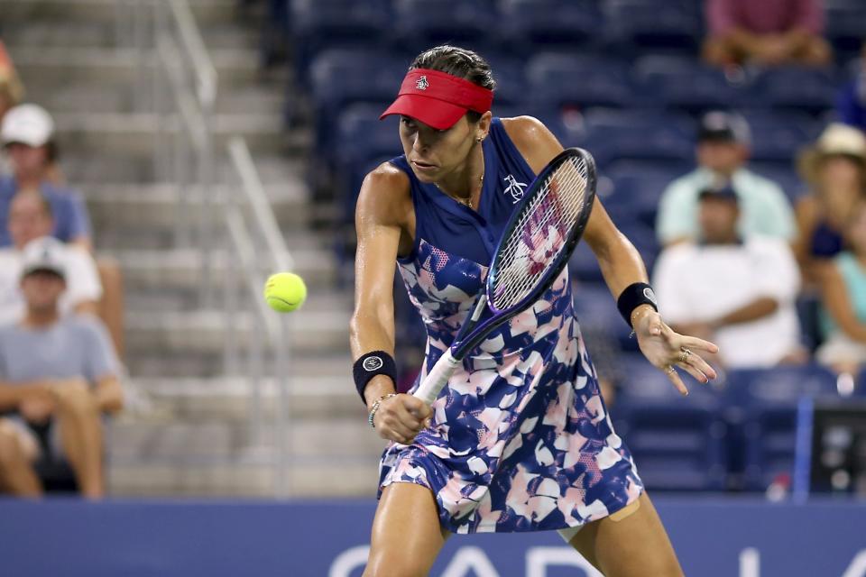 Ajla Tomljanovic, of Australia, returns a shot to Liudmila Samsonova, of Russia, during the fourth round of the U.S. Open tennis championships, Sunday, Sept. 4, 2022, in New York. (AP Photo/Andres Kudacki)