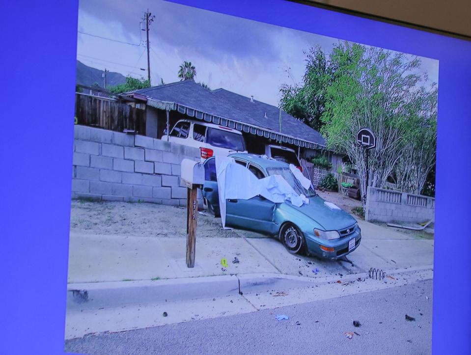 A photo of the car in which three people were found shot to death in 2019 in Palm Springs. A fourth victim was found blocks away.