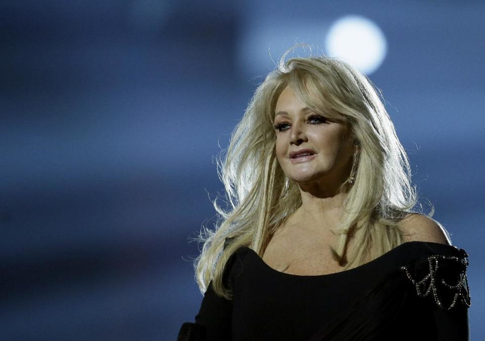 Bonnie Tyler of Britain performs her song "Believe in Me" during a rehearsal for the final of the Eurovision Song Contest at the Malmo Arena in Malmo, Sweden, Friday, May 17, 2013. The contest is run by European television broadcasters with the event being held in Sweden as they won the competition in 2012, the final will be held in Malmo on May 18. (AP Photo/Alastair Grant)