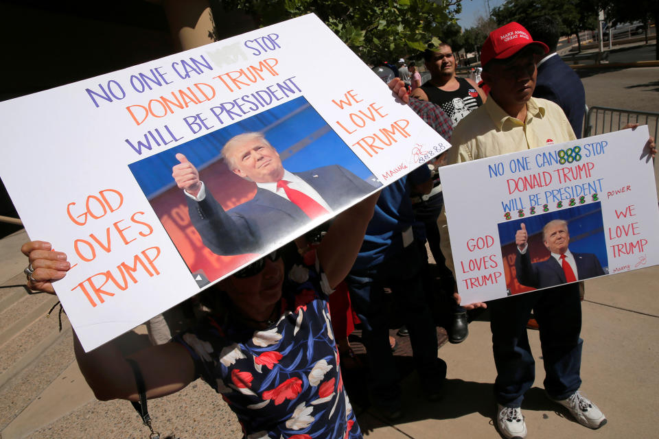 <p>Supporters of Republican presidential candidate Donald Trump stand in line before the start of his rally in Albuquerque, N.M., Tuesday, May 24, 2016. (Reuters/Jonathan Ernst) </p>