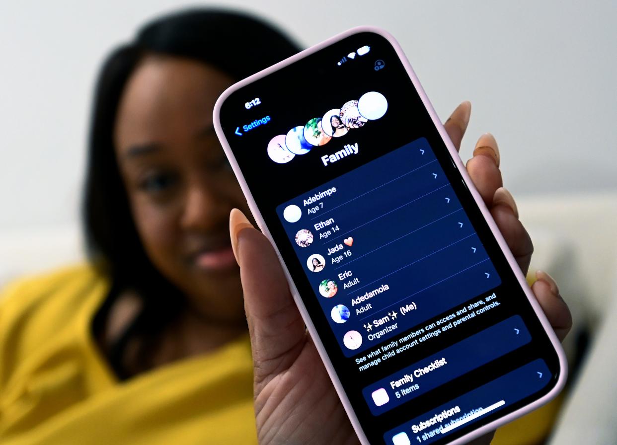 Samantha Sharpe displays how she sets age-appropriate app usage guidelines for family members on Friday, March 22, 2024, in Nashville, Tenn.