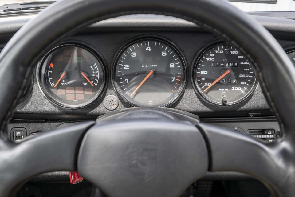 a car dashboard with gauges