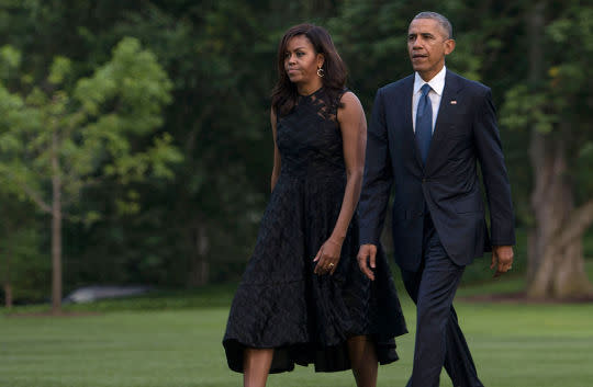 First Lady Michelle Obama and President Barack Obama exit Marine One after traveling to Dallas, Texas. The First Lady wore a Christian Siriano design. (Photo: Getty)