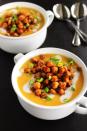 <p>Skip the croutons and roast chickpeas with salt, pepper, paprika, and cayenne for some crunch atop soup that's thickened with coconut milk and smoked gouda.</p><p><em><a href="http://www.rhubarbarians.com/butternut-squash-soup-smoked-gouda-spicy-chickpeas/" rel="nofollow noopener" target="_blank" data-ylk="slk:Get the recipe from Rhubarbarians »;elm:context_link;itc:0;sec:content-canvas" class="link ">Get the recipe from Rhubarbarians »</a></em></p>