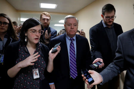 Sen. Lindsey Graham (R-SC) speaks with reporters ahead of the party luncheons on Capitol Hill in Washington, U.S. January 23, 2018. REUTERS/Aaron P. Bernstein