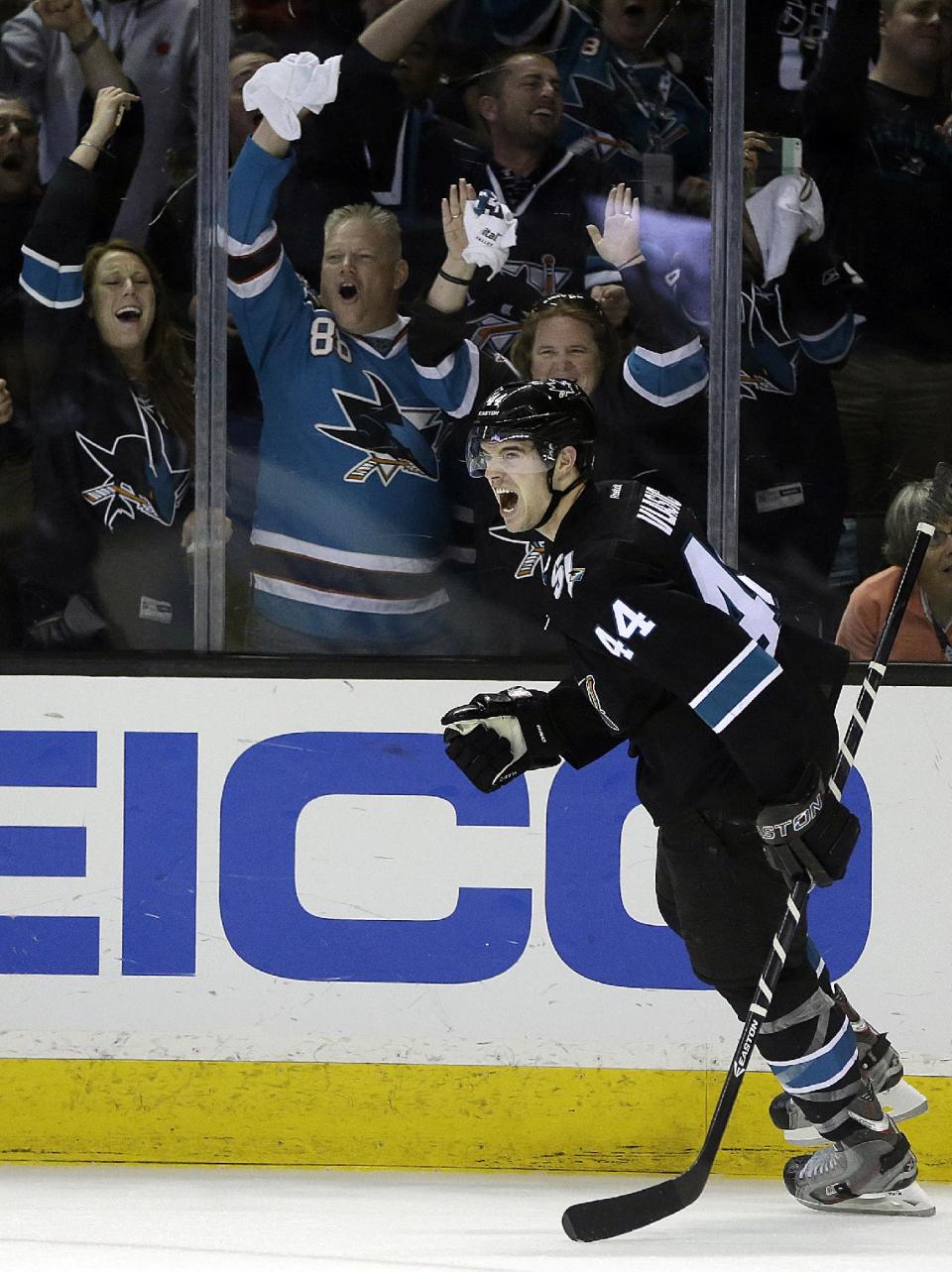 San Jose Sharks' Marc-Edouard Vlasic (44) celebrates after scoring against the Los Angeles Kings during the second period of Game 1 of an NHL hockey first-round playoff series Thursday, April 17, 2014, in San Jose, Calif. (AP Photo/Ben Margot)