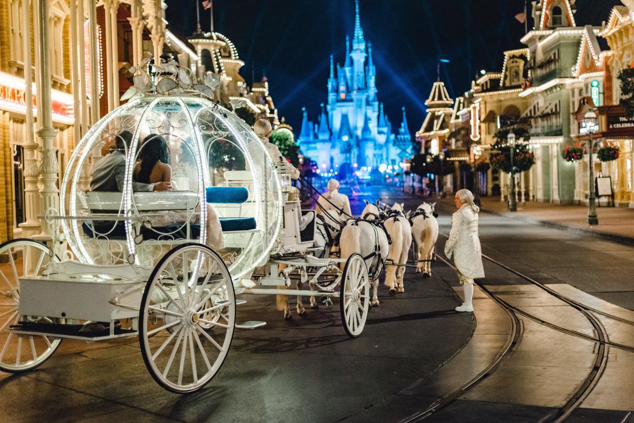 A ride in Cinderella's carriage is one of many experiences couples can book for their Disney wedding.