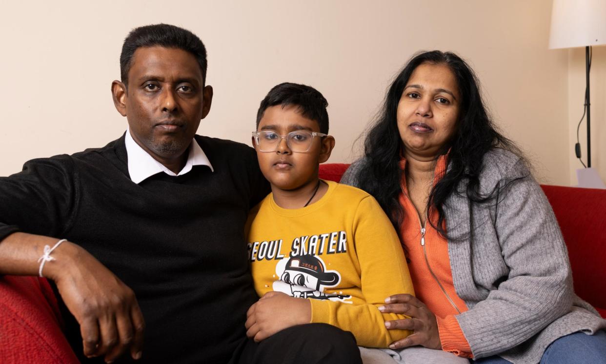 <span>Malwattege Peiris with her husband and son, who have now been told they can stay together in the UK.</span><span>Photograph: Graeme Robertson/The Guardian</span>