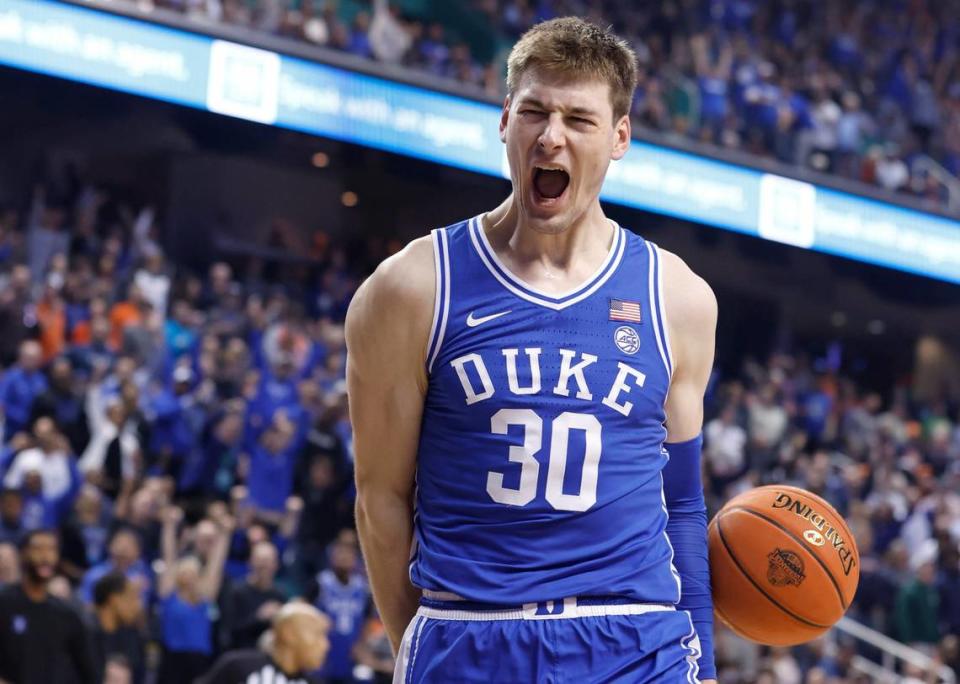 Duke’s Kyle Filipowski (30) celebrates slamming in two during the second half of Duke’s game against Virginia in the finals of the ACC Men’s Basketball Tournament in Greensboro, N.C., Saturday, March 11, 2023.