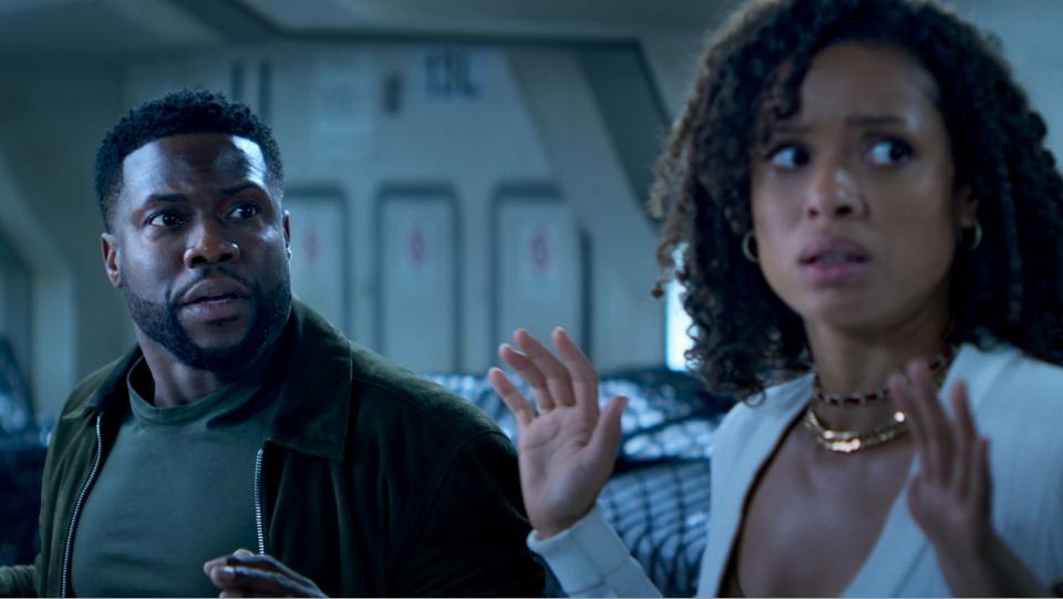 Kevin Hart and Gugu Mbatha-Raw in Lift