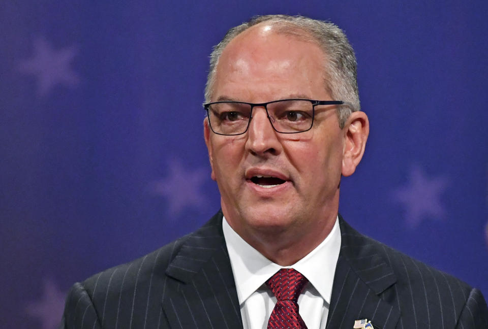 FILE - In this Oct. 30, 2019 file photo, Democratic Louisiana Gov. John Bel Edwards speaks on set before the start of the Louisiana Governor's runoff debate at Louisiana Public Broadcasting in Baton Rouge, La. To keep his seat as the Deep South’s only Democratic governor, Edwards needs strong turnout from Louisiana’s black voters, who lean heavily Democratic and who lagged in getting to the polls for the primary election. Edwards and his supporters are laboring to reverse that trend ahead of the Nov. 16 runoff election against Republican businessman Eddie Rispone. (Hilary Scheinuk/The Advocate via AP, File)