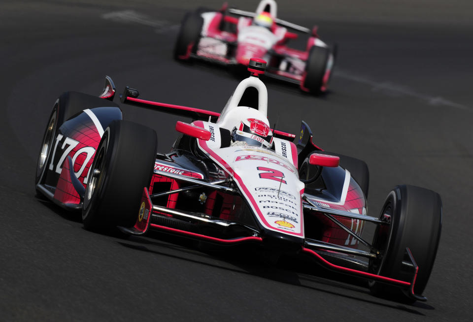 INDIANAPOLIS, IN - MAY 25: Ryan Briscoe of Australia driver of the Team Penske Dallara Chevrolet leads Justin Wilson during final practice on Carb Day for the Indianapolis 500 on May 25, 2012 at the Indianapolis Motor Speedway in Indianapolis, Indiana. (Photo by Robert Laberge/Getty Images)