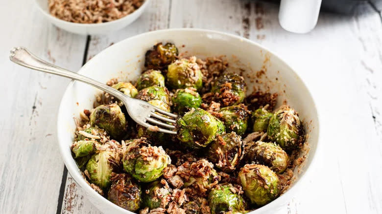 Bowl of Brussels sprouts with onion